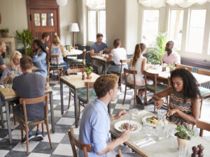 customers-enjoying-meals-busy-restaurant.jpg