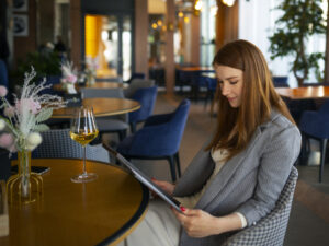 woman-looking-through-menu-restaurant.jpg